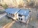 Charming single-story brick home featuring a long driveway, well-kept lawn, and mature trees at 4011 Lake Carlton Rd, Loganville, GA 30052