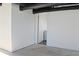 Partially finished basement featuring freshly painted walls with doorway leading to bathroom at 4011 Lake Carlton Rd, Loganville, GA 30052