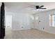 Bright living room featuring sleek floors, fireplace, and large windows at 4011 Lake Carlton Rd, Loganville, GA 30052