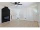 Bright living room featuring modern floors, sleek fireplace, and neutral paint at 4011 Lake Carlton Rd, Loganville, GA 30052