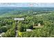 Wooded Loganville property showcasing proximity to Hwy 78 along Grady Smith Rd. Shed shown inset at 4030 Grady Smith Road Rd, Loganville, GA 30052