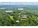 Wooded Loganville property showcasing proximity to the Alcovey River and Worth Ave along Grady Smith Rd at 4030 Grady Smith Road Rd, Loganville, GA 30052