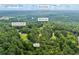 Wooded Loganville property showcasing proximity to the Alcovey River and Worth Ave along Grady Smith Rd at 4030 Grady Smith Road Rd, Loganville, GA 30052