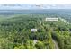 Wooded Loganville property showcasing proximity to Windsor along Grady Smith Rd at 4030 Grady Smith Road Rd, Loganville, GA 30052