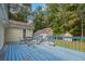 Exterior shot of the back deck with a table and chairs at 4030 Grady Smith Road Rd, Loganville, GA 30052