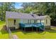 An elevated view of the backyard of the home with a blue painted deck at 4030 Grady Smith Road Rd, Loganville, GA 30052