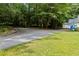 View of the property's long driveway that leads up to the house at 4030 Grady Smith Road Rd, Loganville, GA 30052