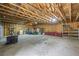Large, unfinished garage space with shelving units at 4030 Grady Smith Road Rd, Loganville, GA 30052
