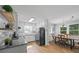 Bright kitchen with white cabinets, granite countertops, and stainless steel appliances at 4030 Grady Smith Road Rd, Loganville, GA 30052