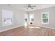 Bedroom featuring natural light, multiple windows, fan and neutral finishes at 3286 Bachelor Street, East Point, GA 30344
