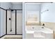 Bathroom featuring a soaking tub and glass shower at 5430 Breckinridge Ln, Cumming, GA 30040