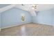 Spacious bedroom with light wood flooring, ceiling fan and natural light at 5430 Breckinridge Ln, Cumming, GA 30040