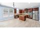 Modern kitchen with stainless steel appliances, granite counters, and a center island at 5430 Breckinridge Ln, Cumming, GA 30040
