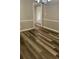 Dining Room exhibiting new wood flooring, modern wall trim and neutral paint at 188 Rue Fontaine, Lithonia, GA 30038