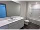 Bathroom featuring a large mirror, vanity, tub, and shower offers lots of space and is very bright at 34 Sonoma Drive, Dallas, GA 30157