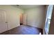 Cozy bedroom with neutral carpet, a window, and a closet door at 34 Sonoma Drive, Dallas, GA 30157