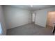 Neutral bedroom offers plenty of space with large windows and a closet across the room at 34 Sonoma Drive, Dallas, GA 30157