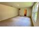 Large bedroom with neutral carpet, good natural light, and an ensuite bath at 34 Sonoma Drive, Dallas, GA 30157
