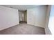 Neutral bedroom offers plenty of space with large windows and a closet across the room at 34 Sonoma Drive, Dallas, GA 30157