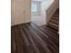 Inviting foyer with hardwood flooring and a staircase leading to the upper level at 34 Sonoma Drive, Dallas, GA 30157
