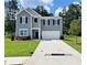 Charming two-story home with a well-manicured lawn and a two car garage at 34 Sonoma Drive, Dallas, GA 30157