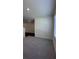 Spacious living room with carpeted flooring and natural light from the window at 34 Sonoma Drive, Dallas, GA 30157