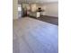 Open-concept living space with modern kitchen featuring stainless steel appliances and island at 34 Sonoma Drive, Dallas, GA 30157