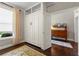 Spare bedroom with Murphy bed, wood floors, and natural light at 5015 Monticello Dr, Villa Rica, GA 30180