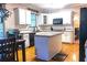 Updated kitchen with granite countertops and stainless steel appliances at 555 Stoneglen Sw, Atlanta, GA 30331