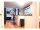 Kitchen featuring white cabinets, granite countertops, and stainless steel appliances at 555 Stoneglen Sw, Atlanta, GA 30331