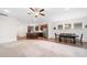 Open concept space showing the kitchen, living room, and dining space, all adjacent at 205 Floral Valley Dr, Woodstock, GA 30188