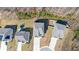 Aerial of a residential neighborhood with homes, landscaping, and recreational trampoline at 2536 Dayview Ln, Atlanta, GA 30331