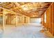 A large unfinished basement with exposed beams and a concrete floor, ready to be transformed at 2536 Dayview Ln, Atlanta, GA 30331