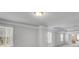 Bedroom featuring a tray ceiling and two windows at 2536 Dayview Ln, Atlanta, GA 30331