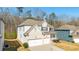 Charming two-story home with a brick facade, two-car garage, and inviting front porch at 2536 Dayview Ln, Atlanta, GA 30331
