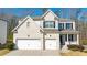 Charming two-story home with a brick facade, two-car garage, and inviting front porch at 2536 Dayview Ln, Atlanta, GA 30331