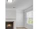 A well-lit living room showcasing a fireplace and a bright window at 2536 Dayview Ln, Atlanta, GA 30331