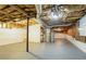 Unfinished basement with exposed ceiling, utilities, and stairs at 356 Waterway Trl, Powder Springs, GA 30127