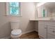 Bathroom featuring a white vanity and toilet at 356 Waterway Trl, Powder Springs, GA 30127