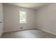 Neutral bedroom with carpet, window, fresh paint, and closet for storage at 356 Waterway Trl, Powder Springs, GA 30127
