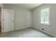 Bedroom with plush carpeting, natural light, and neutral walls at 356 Waterway Trl, Powder Springs, GA 30127