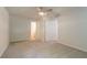 Bedroom featuring carpet and three doors at 356 Waterway Trl, Powder Springs, GA 30127