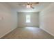 Neutral bedroom with carpet and a window at 356 Waterway Trl, Powder Springs, GA 30127