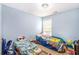 Shared ' bedroom with two beds and lots of toys at 485 Greyhawk Way, Fairburn, GA 30213