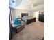 Main bedroom with a ceiling fan, a bed, an easy chair, and a dresser at 5625 Jamerson Dr, Atlanta, GA 30349