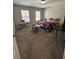 Bedroom with musical keyboard, desk and bright natural light at 5625 Jamerson Dr, Atlanta, GA 30349