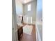 Grand foyer with high ceilings, hardwood flooring, and white trim, creating a spacious and elegant entrance at 5625 Jamerson Dr, Atlanta, GA 30349