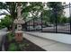 Community entrance with a sign indicating 'City of Decatur' and access to resident parking at 108 Park Pl # 108, Atlanta, GA 30030