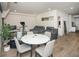 Bright and open living area with hardwood floors, modern furniture, and ample space for both living and dining at 108 Park Pl # 108, Atlanta, GA 30030