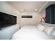 Main bedroom featuring a large bed, modern decor, and great lighting at 108 Park Pl # 108, Atlanta, GA 30030